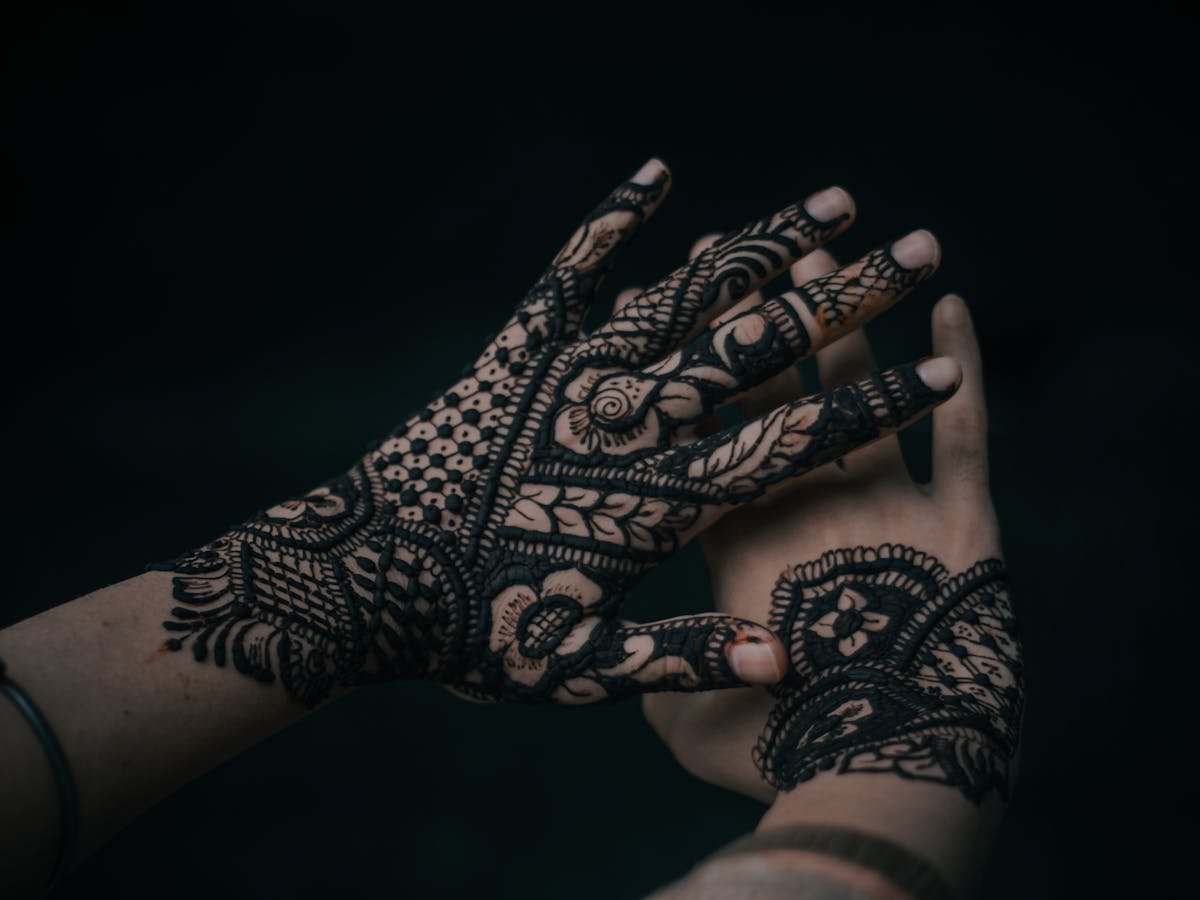 Dark natural henna stain on hands