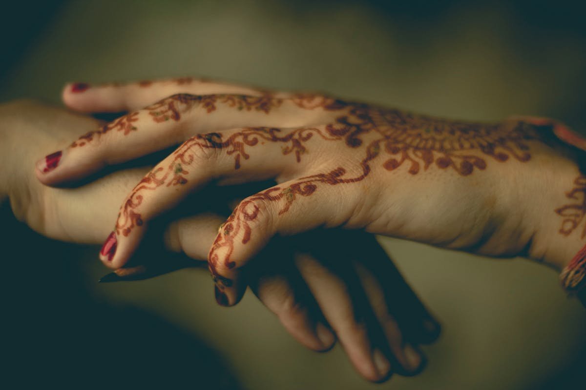 Wedding mehndi hands with detailed patterns